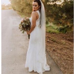 Beautiful wedding dress, off white lace. Size 6.